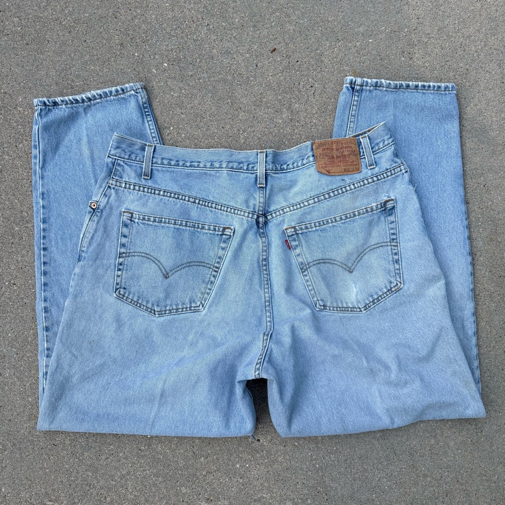 VTG Y2K Levi's 560 Loose Fit Tapered Leg Light Blue Jeans 42x32 worn in faded